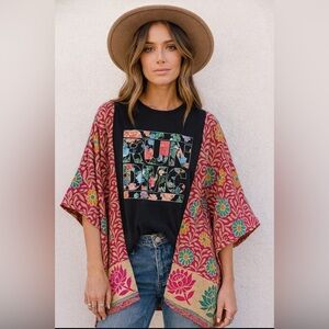 Upcycled RUN DMC T W/ Floral Kantha sleeves, by Susie.